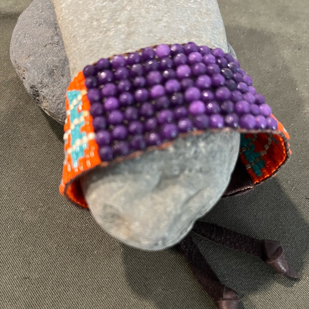 Beaded gemstone center beads with beaded pattern sides